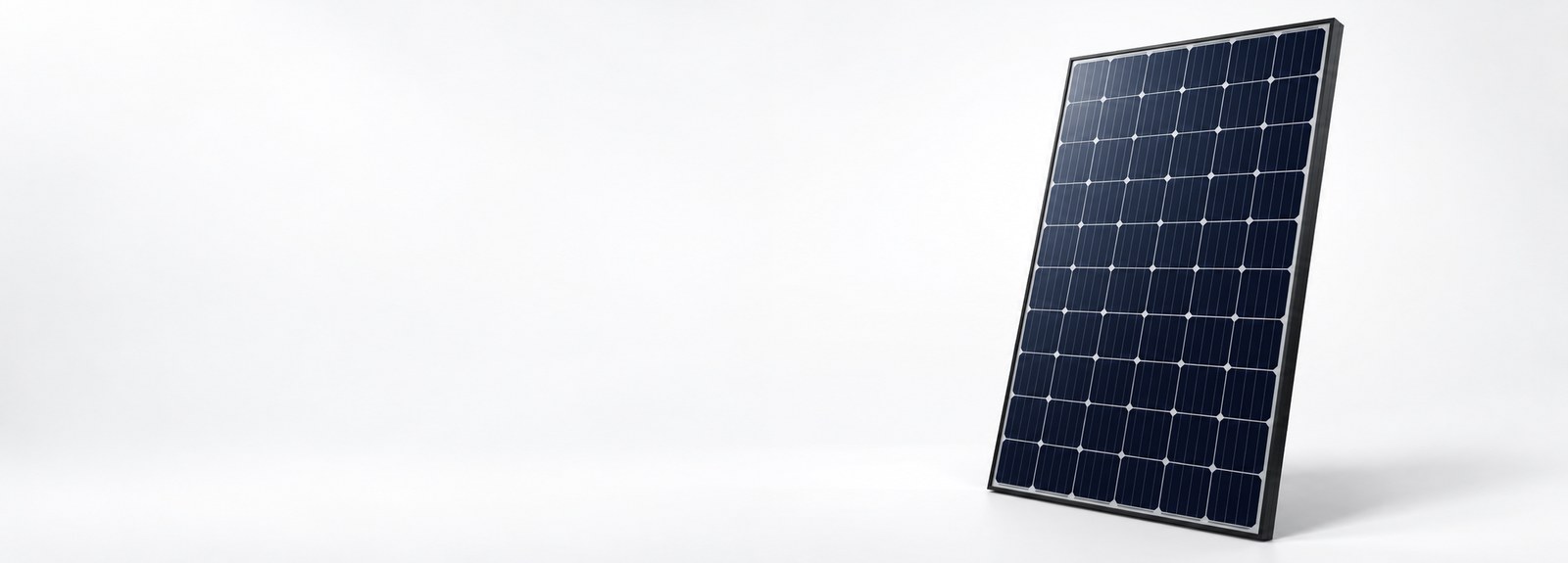 Wide studio banner showing a single unbranded black framed solar panel standing at an angle on a clean white background,
