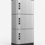 A modular stackable home battery tower, 15kWh lithium storage, tall floor-standing silver and black unit