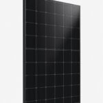 A single full black monocrystalline solar panel 410W, black frame and black cells, standing upright in three-quarter vie