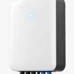 A wall-mount home battery 10kWh, slim white-fronted lithium storage unit with dark grey sides and bottom connectors