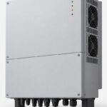 Large three phase 15kW solar inverter, grey metal cabinet with cooling fans and black base feet, unbranded