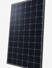 Unbranded monocrystalline 450W solar panel with black frame, shown at a slight angle on a light grey studio background